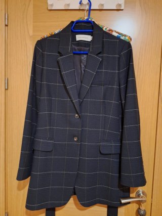 Chaqueta con cinturón de lana tipo Tweed
