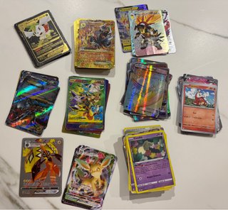 Lote de 124 Cartas Pokémon Variadas
