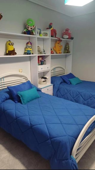 Habitación juvenil con dos camas