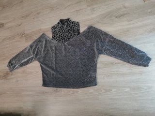 Blusa de fiesta plateada y negra