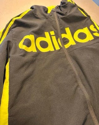 Chaqueta deportiva Hombre Adidas negra y amarilla