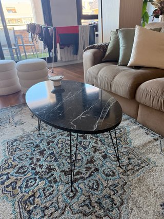 Mesa de centro ovalada de mármol