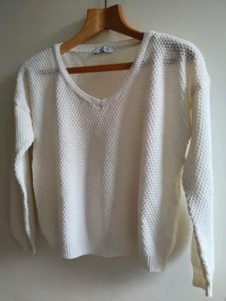 Jersey de punto color crudo.