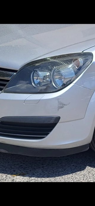 Faro delantero izquierdo Opel Astra H