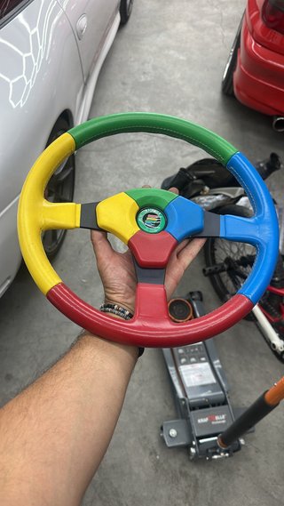 Volante Momo Arlequín