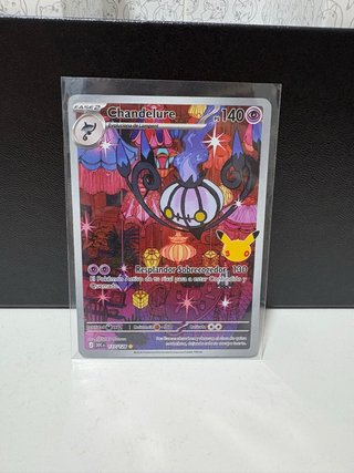 Carta Pokémon Chandelure 137/128 30 Aniversario