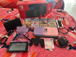 Nintendo Switch con 4 giochi e accessori