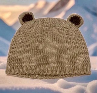 Gorro de invierno en tono beige/crema con orejitas