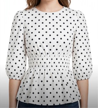 Blusa de lunares blanca y negra