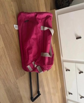 Bolsa de viaje con ruedas rosa