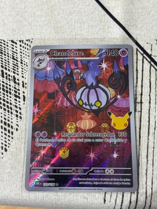 Carta Pokémon Chandelure 137/128 30 Aniversario