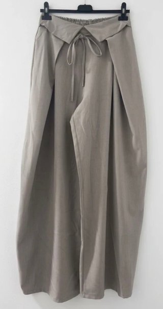Pantalón de corte amplio beige