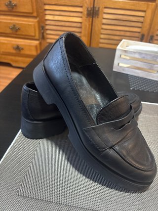 Zapatos planos de piel negros
