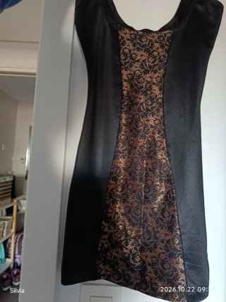 Faja moldeadora negra con tonos cobre y dorado