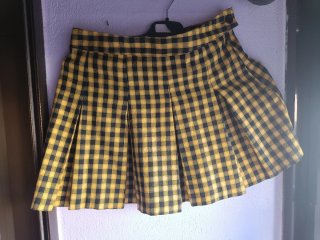 Minifalda de cuadros amarilla y negra