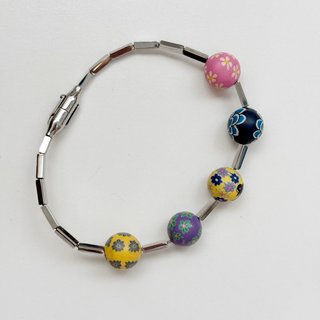 Pulsera Swatch de Acero con Cuentas