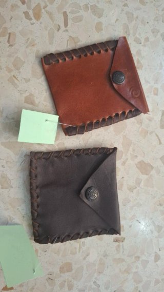Monederos de cuero. Precio por unidad.