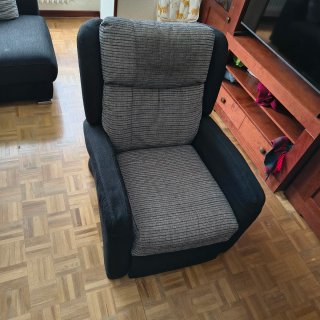 Sillón reclinable gris y negro