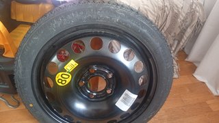 Rueda de repuesto tipo galleta GM