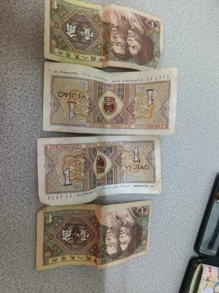 4 Billetes de 1 Yi Jiao