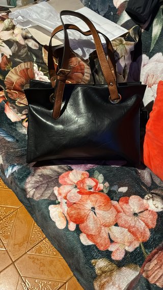 Bolso de mano bicolor negro y marrón