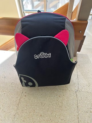 Alzador portátil de viaje Trunki