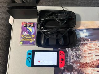 Nintendo Switch con Juego Pokémon Púrpura