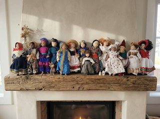 Collezione di 14 bambole in porcellana