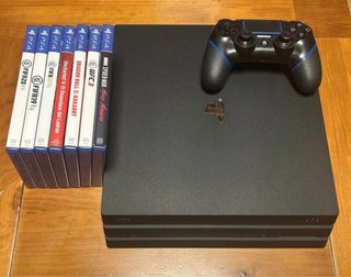 PS4 Pro 1TB + Mando + 7 Juegos
