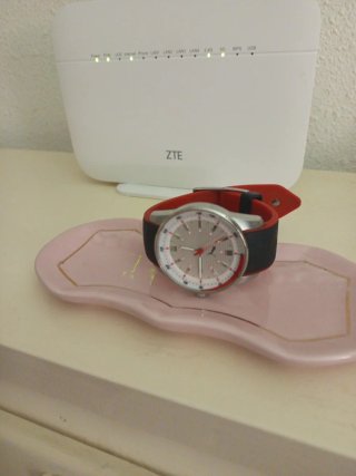 Reloj Puma con correa bicolor pila recién puesta