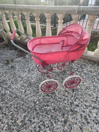 Carrito de Juguete Rosa el mango esta dañado