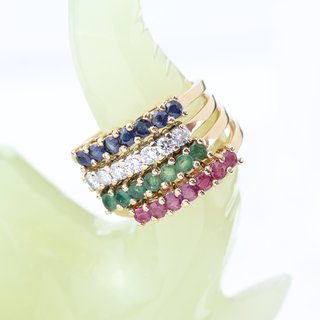 Conjunto de 4 anillos con piedras preciosas