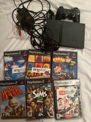Consola PlayStation 2 (PS2) con mando y 6 juegos
