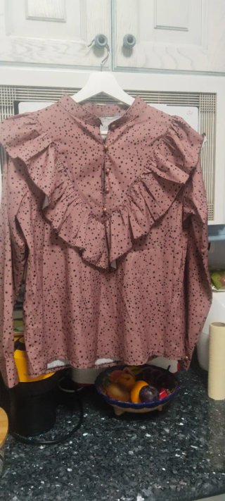 Blusa con volantes y estampado