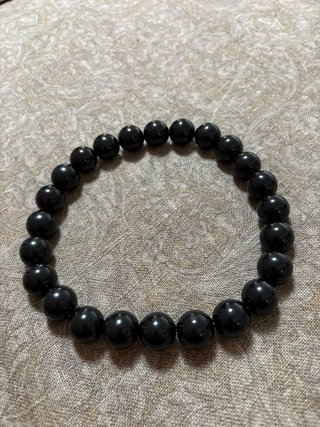 Pulsera elástica de bolas negras