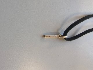 Colgante Tous con cordón negro