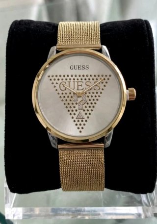 Reloj Guess Dorado en acero inoxidable.
