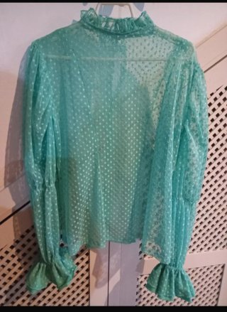 Blusa de encaje turquesa