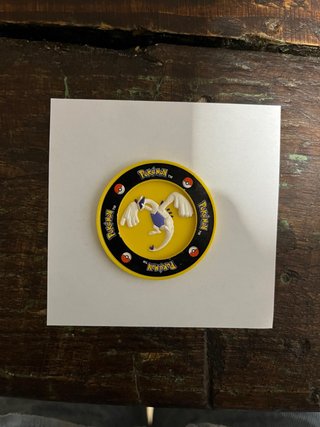 Tazo Lugia Pokémon en Relieve