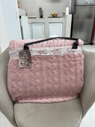 Coperta in pile con borsa coordinata