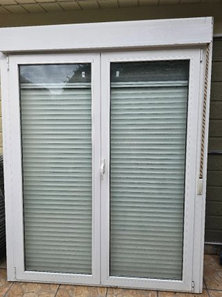 Ventana balconera doble  abatible y oscilobatiente