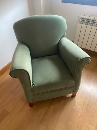 Sillón de tela verde