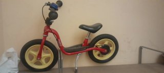 Bicicleta sin pedales PUKY roja y amarilla