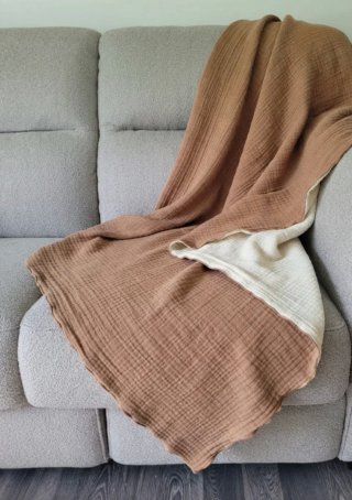 Manta / Manta de sofá de ZARA HOME.