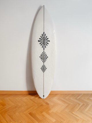 Tabla de Surf Pukas Acid Plan 5.11. con canales.