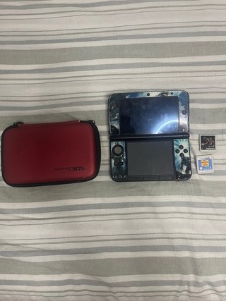 Nintendo 3DS XL con juegos y funda