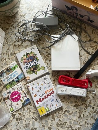 Consola Nintendo Wii con mandos y juegos