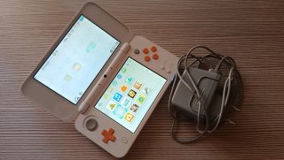 New Nintendo 2DS XL Blanca y Naranja