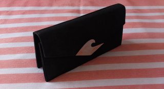Bolso de mano tipo clutch negro