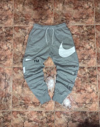 Pantalones Nike Grises